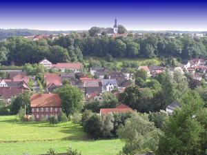 Gartenfewo mit 2 Schlafzimmern und 2 WLAN Homeofficeplätzen Waschtrockner sowie Smart-TV und kostenlose Parkplätze
