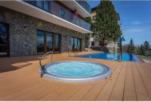 Apartament z basenem i jacuzzi KARMELOWY NA DOLNEJ Green Park Resort A13, ul DOLNA 7A