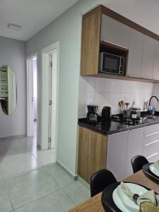 Apartamento inteiro, ar-condicionado e vaga de garagem