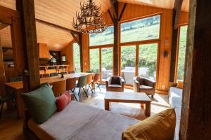 Chalets Aux Sources - 14 personnes - sauna & jacuzzi : photos des chambres