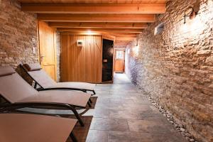 Chalets Aux Sources - 14 personnes - sauna & jacuzzi : photos des chambres