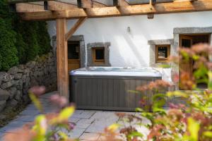 Chalets Aux Sources - 14 personnes - sauna & jacuzzi : photos des chambres
