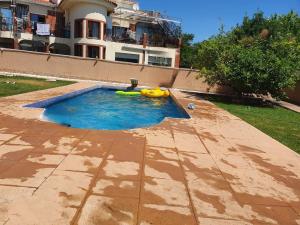 casa con piscina Comarruga