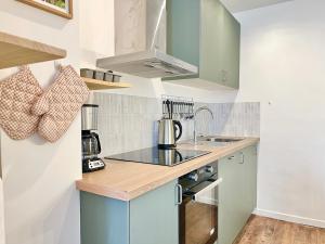 Villas Le St-Hilaire, House in the city center with patio with parking : photos des chambres