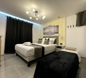 Appartements Parisian Apartment - Paris 10 min - RER A - 3P : photos des chambres