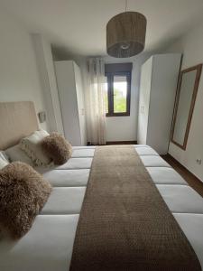 Apartamento en Suances zona de playa con piscina y aparcamiento