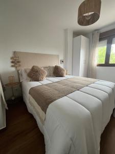 Apartamento en Suances zona de playa con piscina y aparcamiento