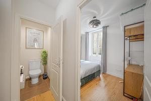 Appartements Le Moliere 1 chambre avec patio : photos des chambres