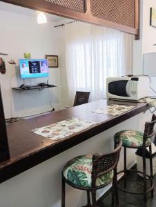 Aconchegante, na Praia Grande! Pertinho da praia