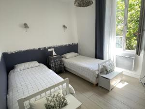 Maisons de vacances Maison charmante proche plage et commerces avec WIFI - FR-1-652-60 : photos des chambres