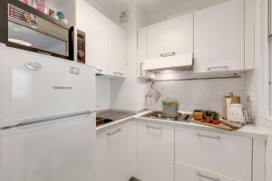 Appartements Saint Laurent Apt Garden View - Happy Rentals : photos des chambres