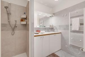 Appartements Saint Laurent Apt Garden View - Happy Rentals : photos des chambres