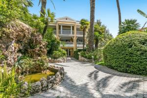 Appartements Saint Laurent Apt Garden View - Happy Rentals : photos des chambres