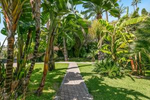 Appartements Saint Laurent Apt Garden View - Happy Rentals : photos des chambres