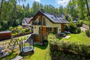 Mazursko - komfortowe apartamenty nad jeziorem, sauna, kominki na parterze