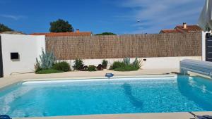 Maisons de vacances Villa contemporaine a 2 pas de la mer avec piscine privee : photos des chambres