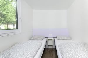 Camping 2000 - Stacaravan Waikiki