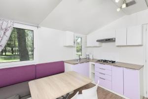 Camping 2000 - Stacaravan Waikiki