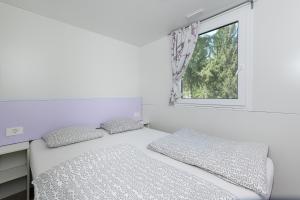 Camping 2000 - Stacaravan Waikiki