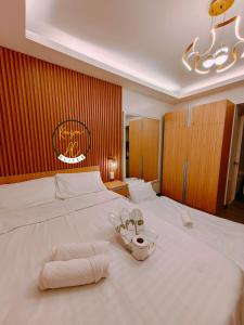 Kaizen - AC Suites at Symfoni Bossa