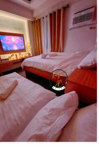 Kaizen - AC Suites at Symfoni Bossa