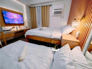 Kaizen - AC Suites at Symfoni Bossa