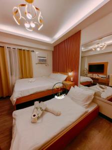 Kaizen - AC Suites at Symfoni Bossa