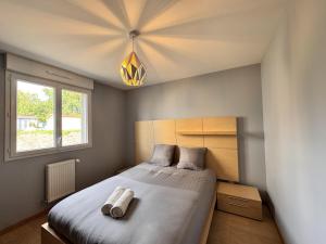 Maisons de vacances L-Art-Monie - Circuit des 24H - Parking - 6p : photos des chambres