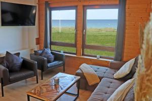 FeWo Waterkant direkt am Strand mit Meerblick und Garten