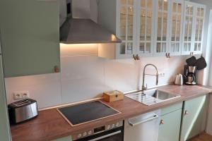 FeWo Waterkant direkt am Strand mit Meerblick und Garten