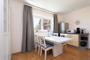 Ferienwohnung Kiter EG mit Terrasse