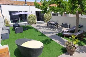 Villas Maison moderne de 100m2 avec jardin : photos des chambres