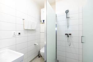 ALURE RESIDENCES 12 & 24h self check-in & private parking next to the apartment building included, CITY CENTER right on SNP Square in a quiet passage, new building, best deal in town