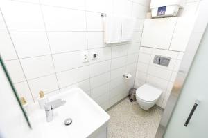 ALURE RESIDENCES 12 & 24h self check-in & private parking next to the apartment building included, CITY CENTER right on SNP Square in a quiet passage, new building, best deal in town