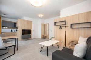ALURE RESIDENCES 12 & 24h self check-in & private parking next to the apartment building included, CITY CENTER right on SNP Square in a quiet passage, new building, best deal in town