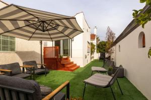 Hauser House, Modern Artful Spanish-style Bungalow