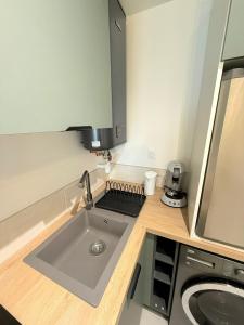 Appartements Cosy Sully - T1 - Place Verdun : photos des chambres