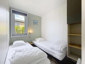 Maisons de vacances Mobil-home Grand Confort 4 pers, 2 chambres, 1 sdb, clim, terrasse & parking, a 200m de la plage - FR-1-361A-2 : photos des chambres