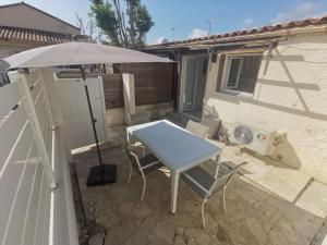 Appartements Plain-pied lumineux & terrasse : photos des chambres
