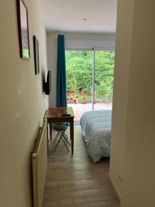 Appartements Le Havre de Paix - Proche Bordeaux et Ocean, avec jardin : photos des chambres