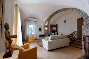 Maisons de vacances Maison de maitre en pierre de 1831 avec vue sur la mer a Porticcio : photos des chambres