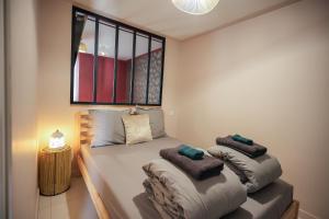 Appartements Spa sous le Mokuren - Escapade Zen a Blois : photos des chambres