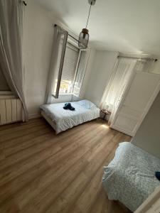 Maisons de vacances Maison de ville cosy pour 4 personnes : photos des chambres