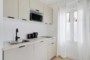 Maisons de vacances Studio 2P Roland Garros Parc des : photos des chambres