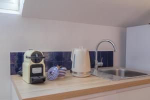 Appartements IDEAL Pro & Couples - Calme- Dernier Etage - Cite des Affaires : photos des chambres