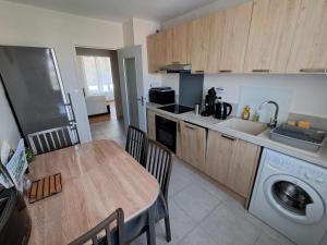 Appartements Le Huit : photos des chambres