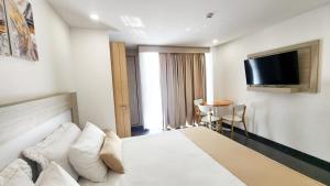 BE Suites Hotel Cali