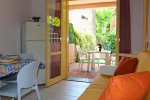 Villaggio Portorosa - La casetta tra le palme 14