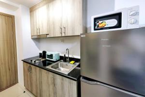 1BR Condotel with Balcony at FAME Residences #FM05-1