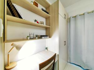 1BR Condotel with Balcony at FAME Residences #FM06-1